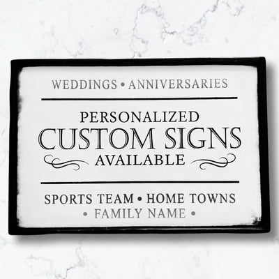 Sign reads Personalized Custom Signs Available. Weddings, Aniversaries, Sports Team, Home Towns, Family name.