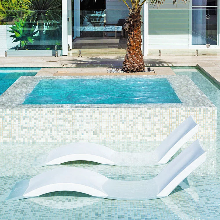 LEDGE Signature In Pool Chaise Lounger Available at Davis Porch and Patio Weatherford Texas Outdoor Living and Patio Furniture Store