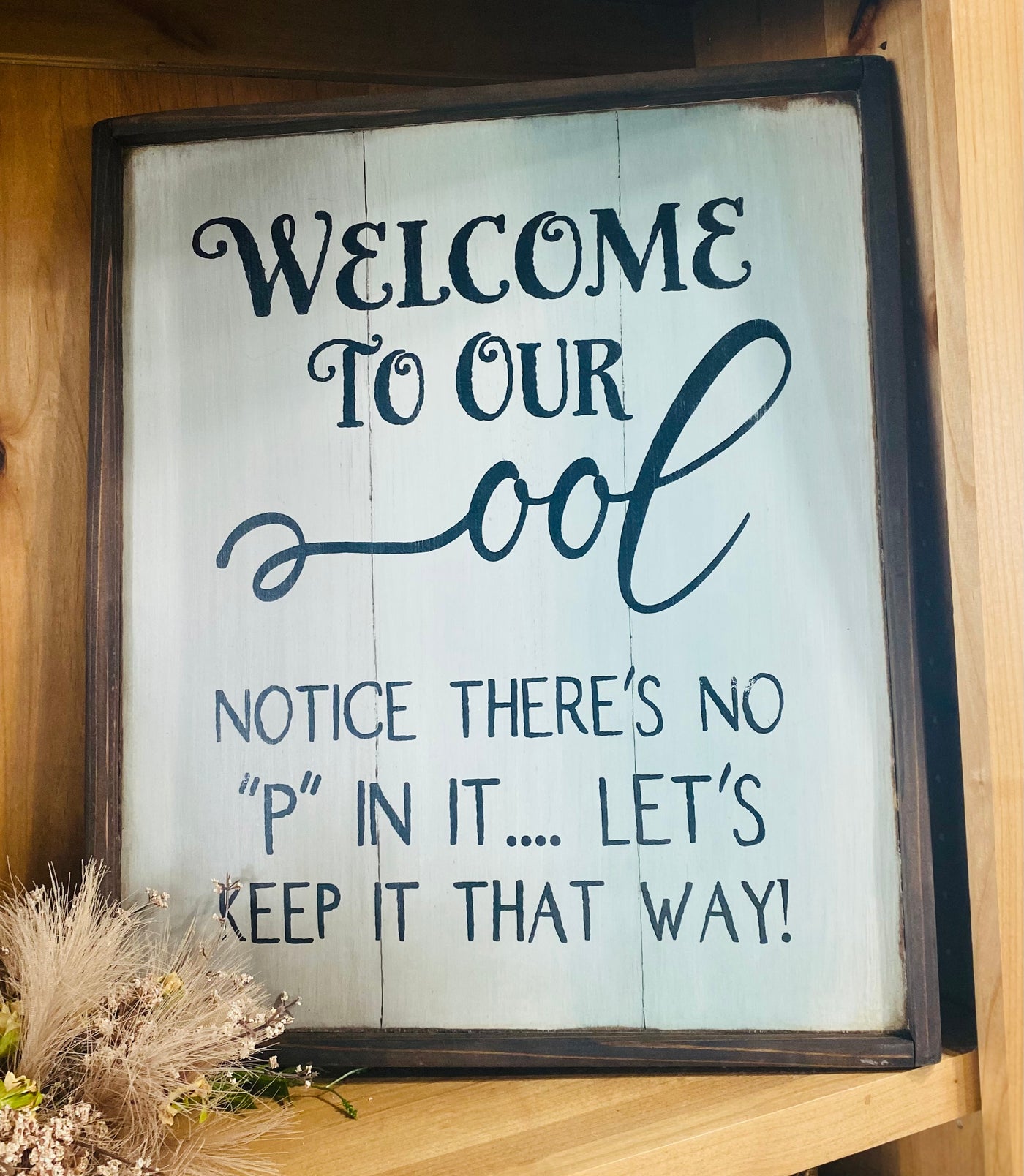 Hand painted wood sign reads Welcome to our ool. Notice there’s no P in it… let’s keep it that way!