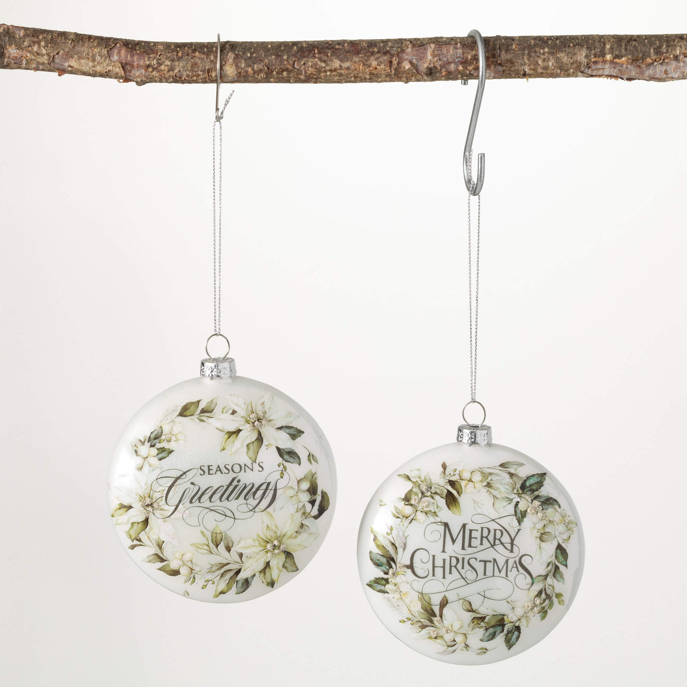 Welcome in the holiday season with these cheerful, wintery white poinsettia garden themed ornaments. Available in Season’s Greetings or Merry Christmas at Davis Porch and Patio Weatherford Texas 
