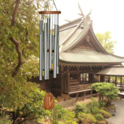 TEAK AND SILVER MAGICAL WINDCHIME. AVAILABLE AT DAVIS PORCH AND PATIO IN WEATHERFORD TEXAS