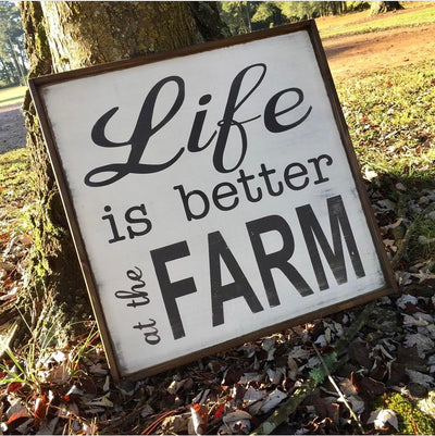 Handmade wood sign reads Life is Better at the Farm