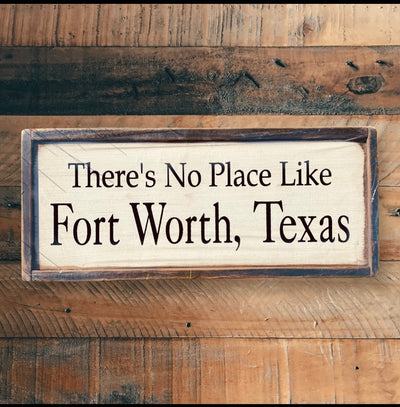 Handmade wood sign reads There’s No Place Like Fort Worth, Texas