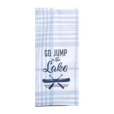 Light blue and white towel embroidered with go jump in the lake in dark blue. Embroidered canoe with oars on lake below text. 