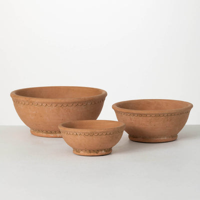 Terracotta colored cement bowl or planter set