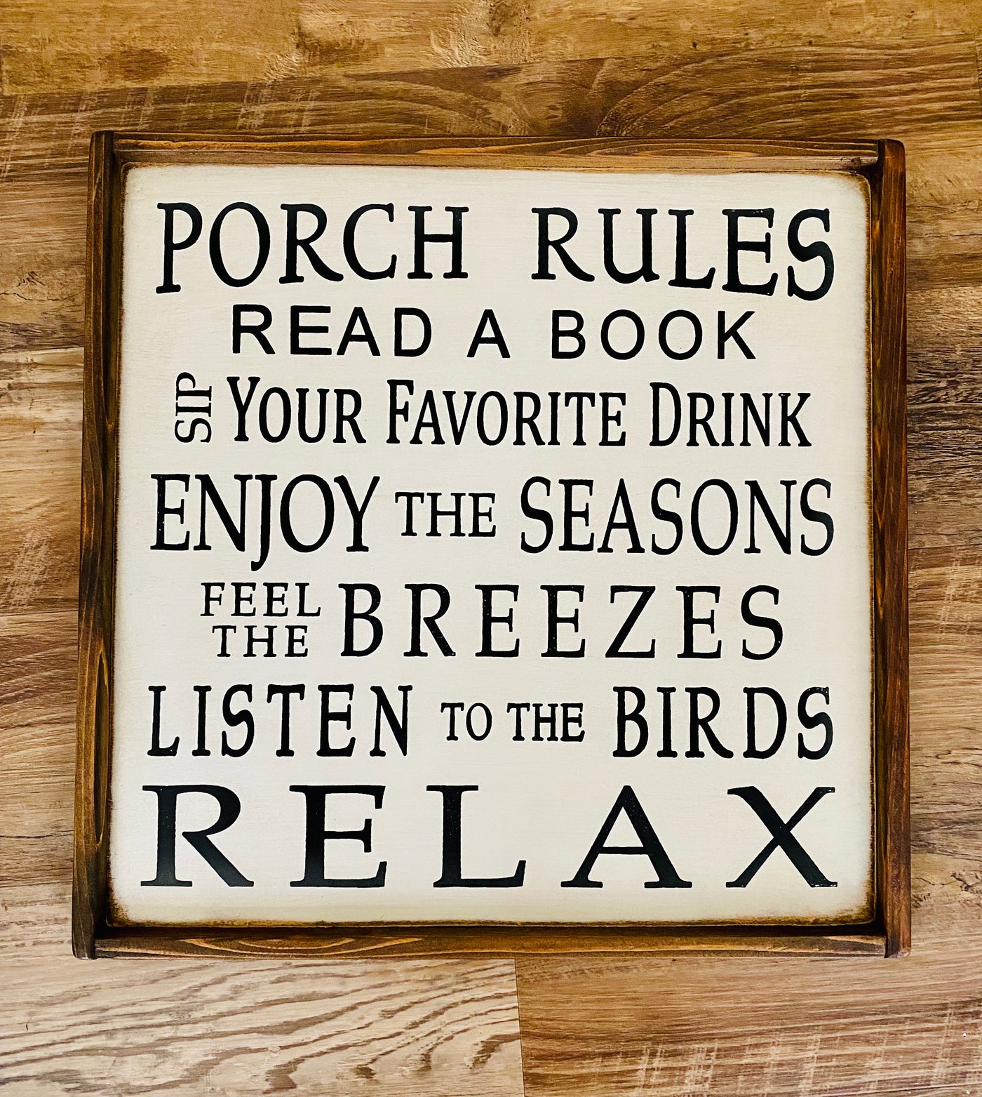 Handmade wooden porch sign reads Porch Rules, Read a Book, Sip Your Favorite Drink, Enjoy The Seasons, Feel The Breezes, Listen to the Birds, RELAX