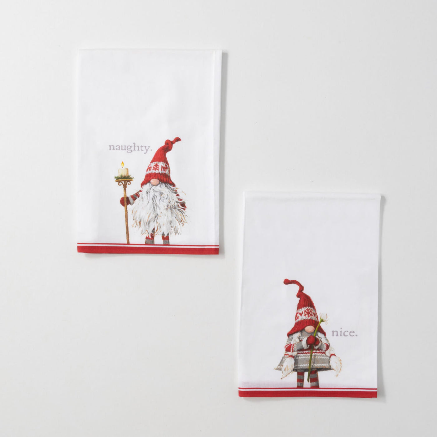 Naughty or Nice? Two tea towels featuring holiday gnomes one reads naughty and the other reads nice