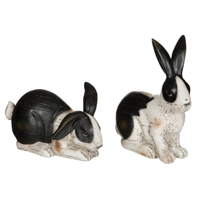 Pair of black and white resin rabbits