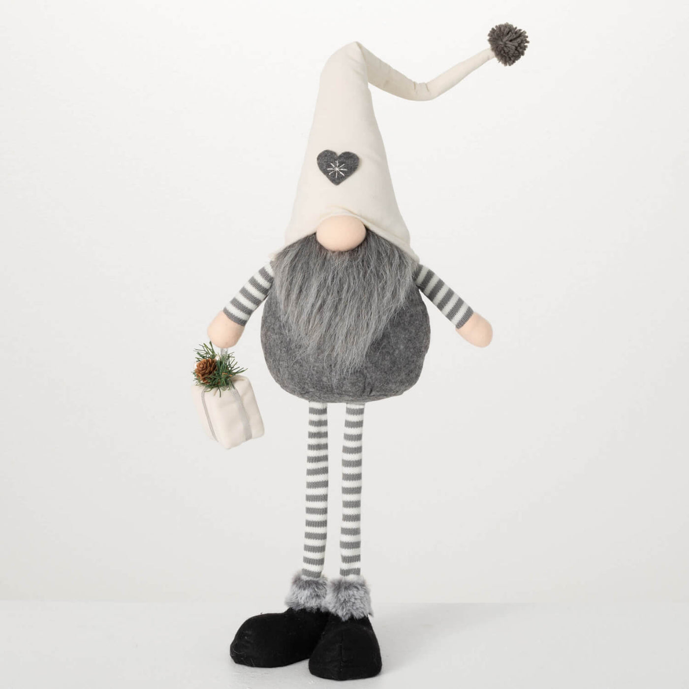 Cream and Gray standing long-legged gnome with a Christmas gift in hand