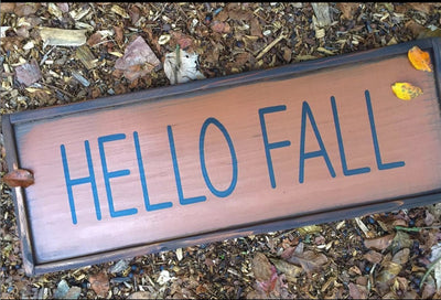 Handmade wooden sign reads Hello Fall  and measures 23 x 10 inches