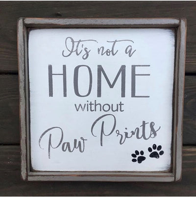 Handmade wood sign reads It's Not A Home Without Paw Prints