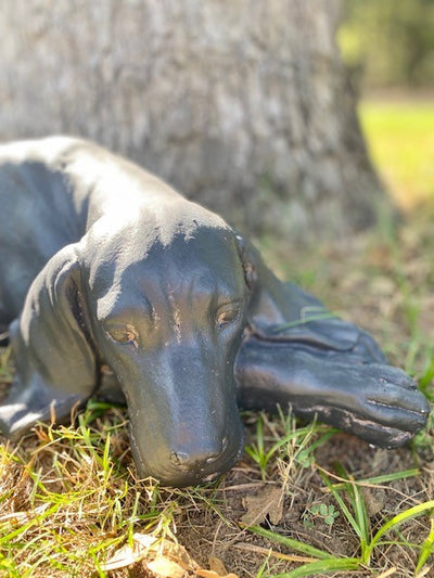 Man's Best Friend Dog Sculpture is 24 inches long charcoal resin Labrador dog sculpture