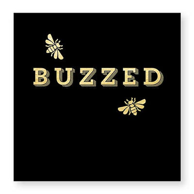 black and gold beverage napkin reads "BUZZED" with golden bee accents