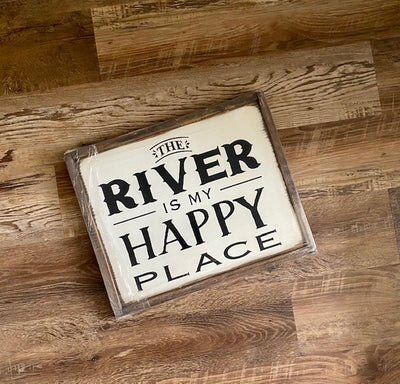 Handmade wood sign reads The River Is My Happy Place