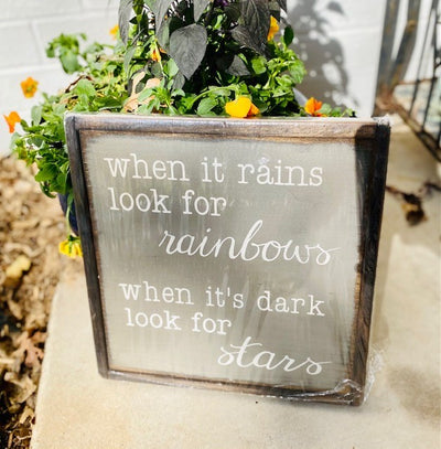 Framed solid wood sign reads when it rains look for rainbows, when it’s dark look for stars