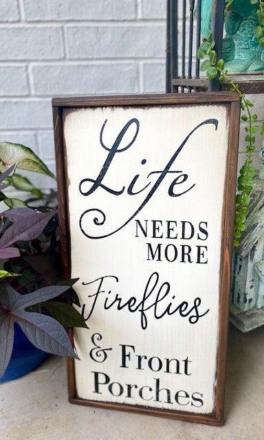 Handmade wooden sign reads Life Needs Mor Fireflies and Front Porches