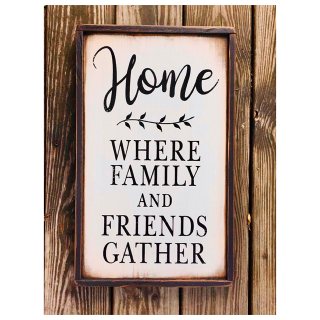 Wood Sign reads Home Where Family and Friends Gather
