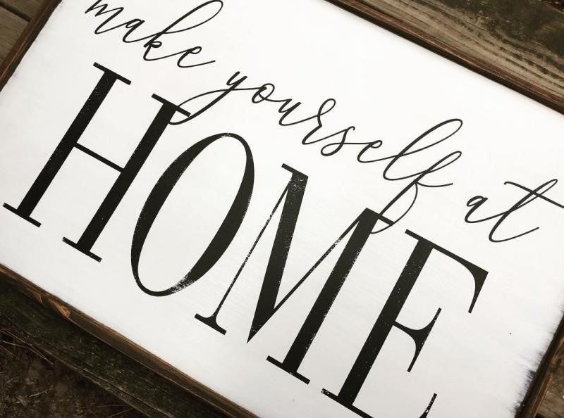 Handmade wood sign reads make yourself at HOME