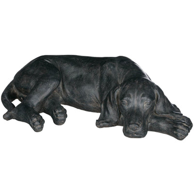 Resin sculpture of a Labrador dog resting