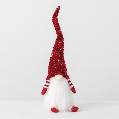 Red sequined sitting gnome in sparkly red elf attire