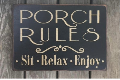 Wood sign reads Porch Rules Sit Relax Enjoy