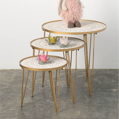 set of 3 nesting tables with gold brushed iron frames.