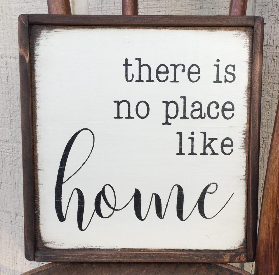 12 inch by 12 inch handmade wood sign reads there is no place like home